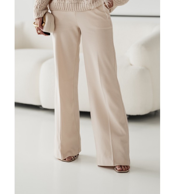 Pantalon élégant couleur crème