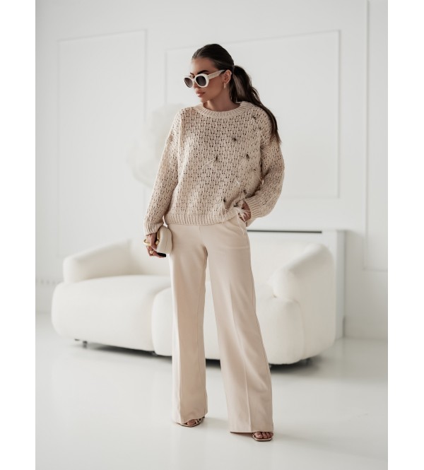 Eleganti pantaloni color crema