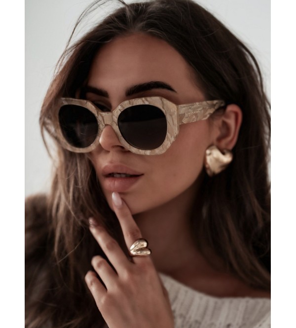 Lunettes de soleil dorées