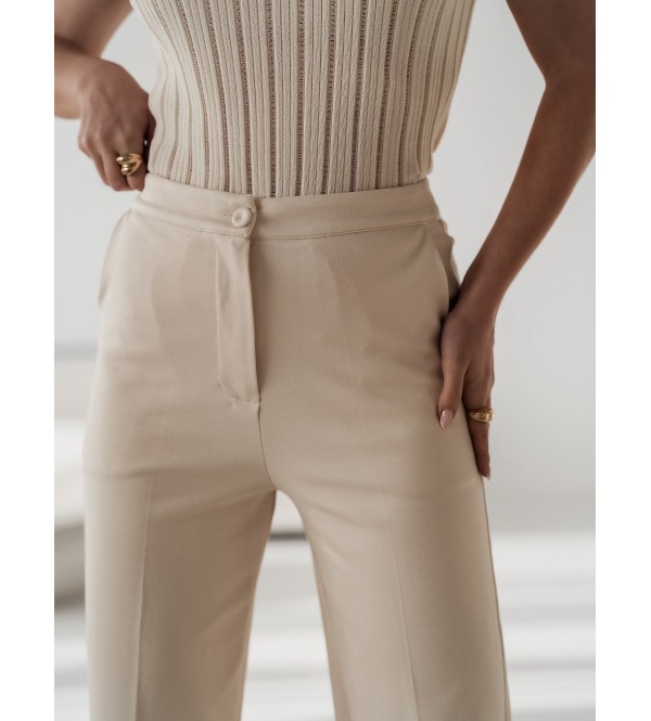 Eleganti pantaloni color crema